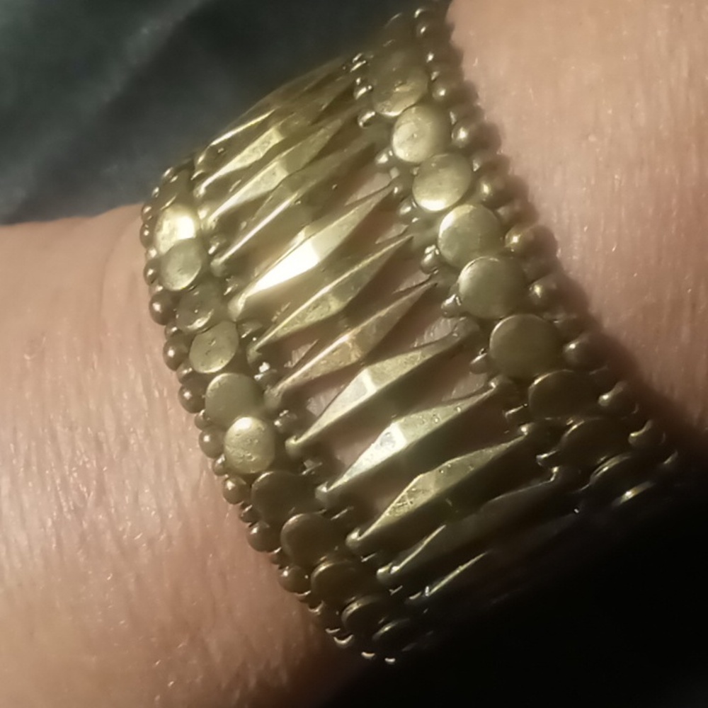 Brassy metal beaded expandable bracelet. Perfect fit.